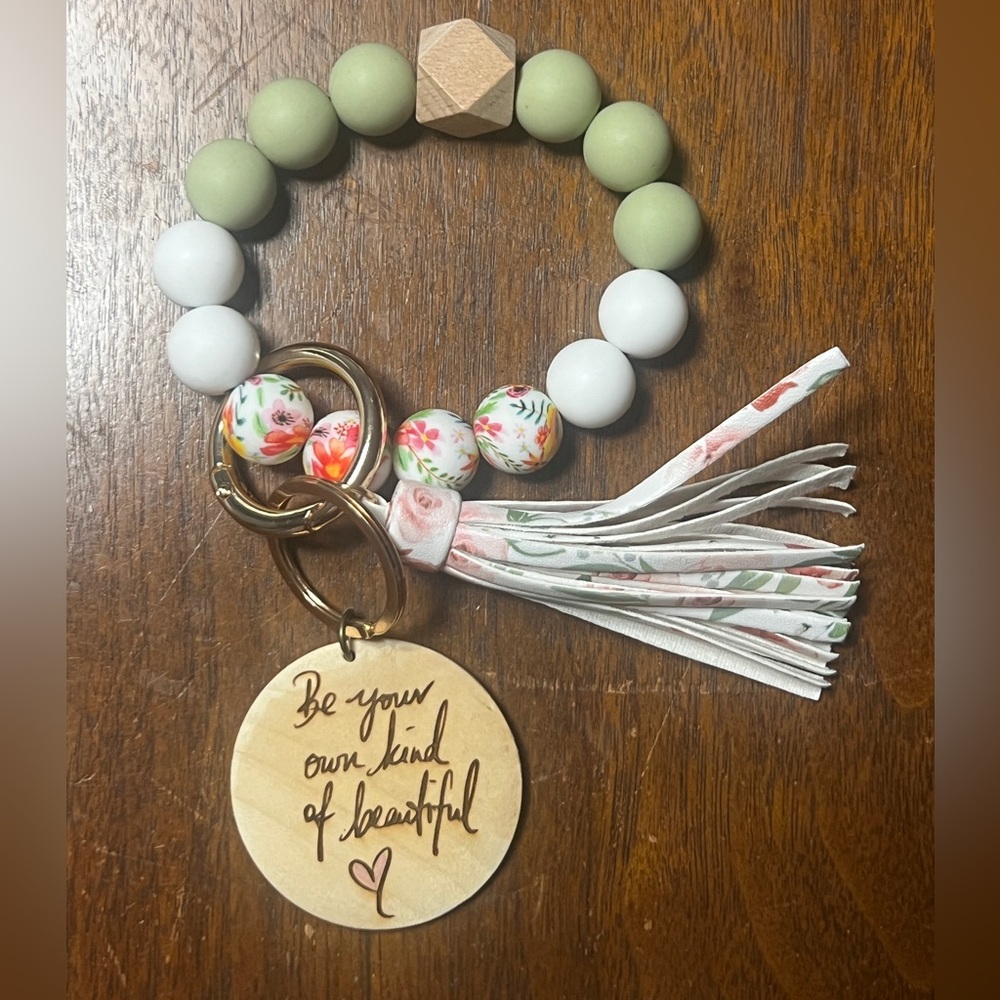 NWOT “Be Your Own Kind of Beautiful” beaded bracelet keychain with tassel